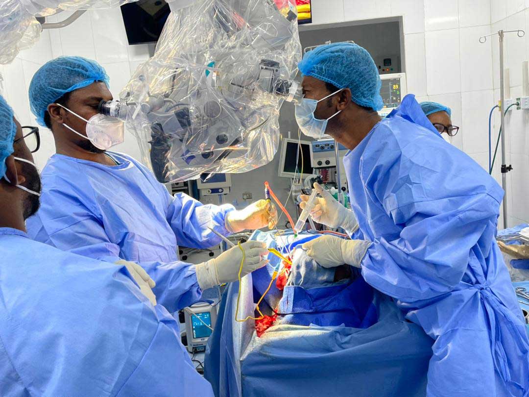 Team performing a laparoscopic surgery.